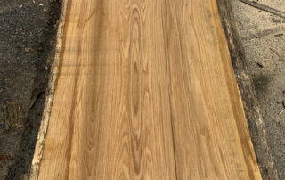 cutting a 30 foot white oak log at Hearne Hardwoods Inc.